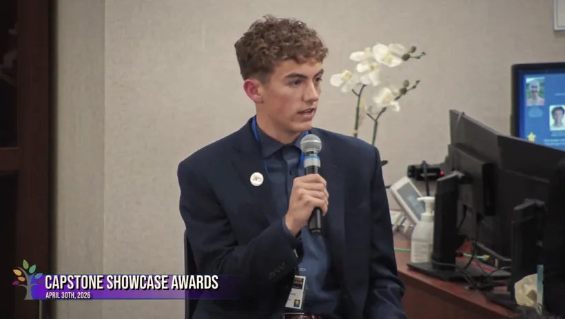 Sam Iannone speaking at the Capstone Showcase Awards on April 30, 2026